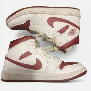 Women’s Red and white Jordan 1 Mid trainers